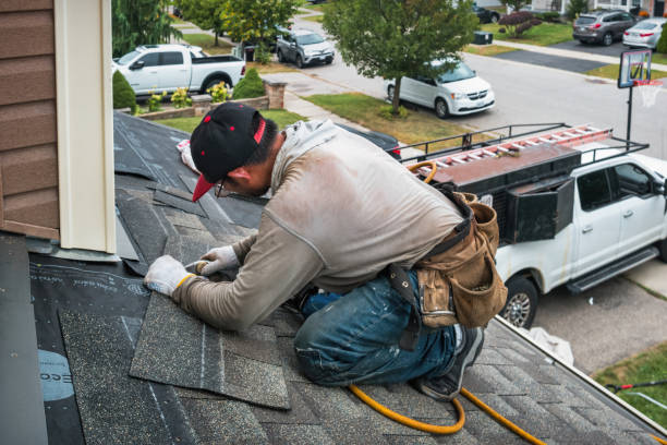 Professional Roof Replacement technician working in Morral, OH